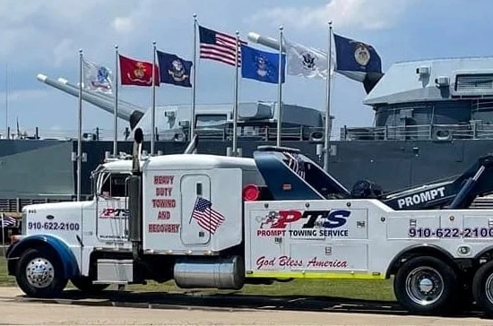 Prompt Towing crane operators performing container restack near Wilmington’s Cold Storage area. Safe and efficient lifting for port freight operations.