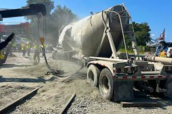 Prompt Towing Service using a heavy crane to correct a load shift near the Port of Wilmington. Expert recovery for container trucks and industrial cargo.